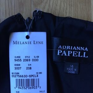 Navy Adrianna Papell dress size 14 new with tags.